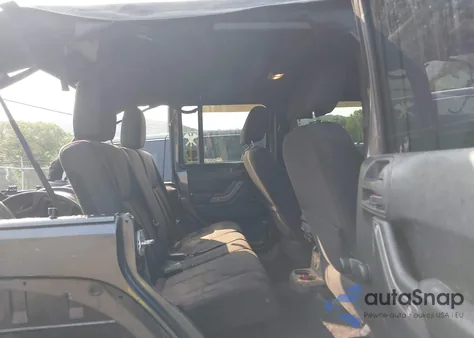 2016 Jeep Wrangler Unlimited Willys Wheeler z USA, uszkodzony, nr VIN 1C4BJWDG1GL294789